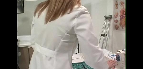  Health care professional Stacy takes good care of her patient in the examination room